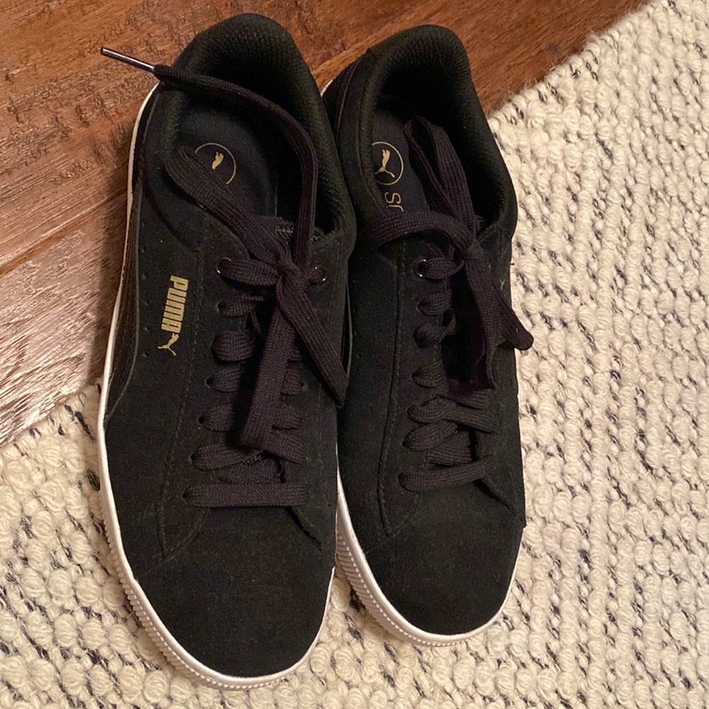 Black Puma sneakers